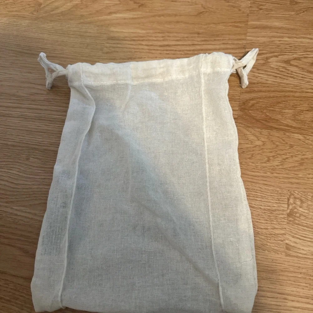 AESOP COTTON MESH DRAWSTRING BAG